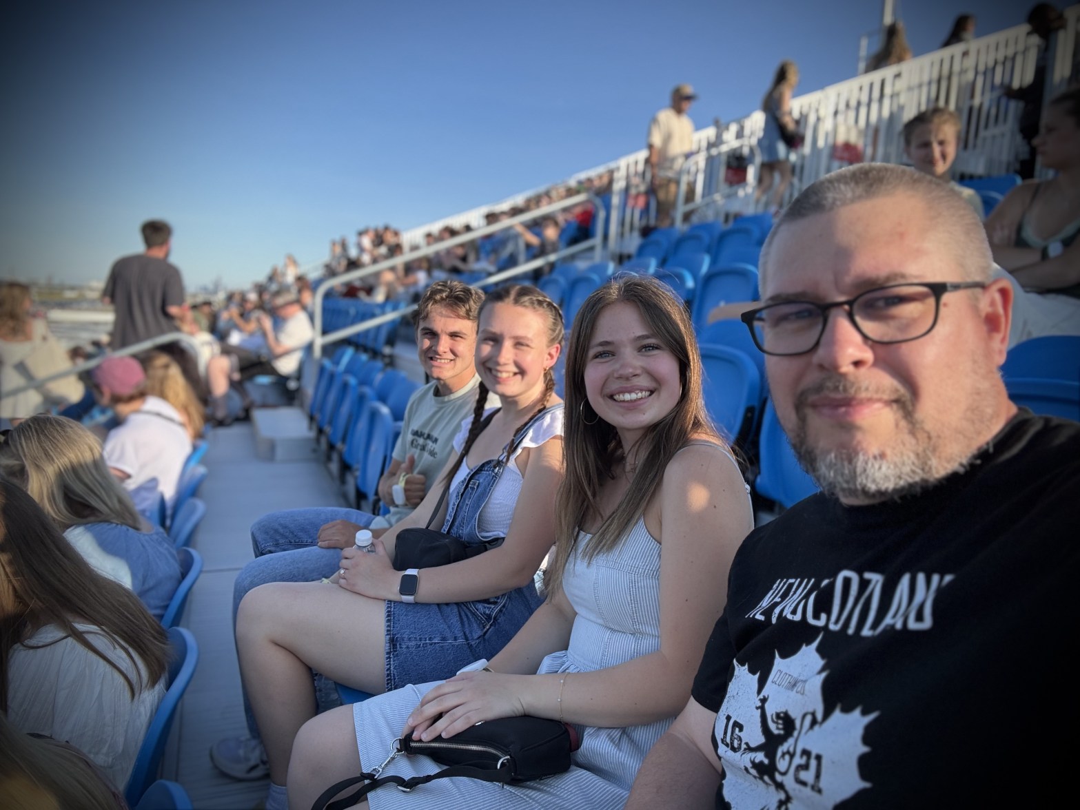 Sandy, Ella, Caile, and Nathan, at the Noah Kahan concert